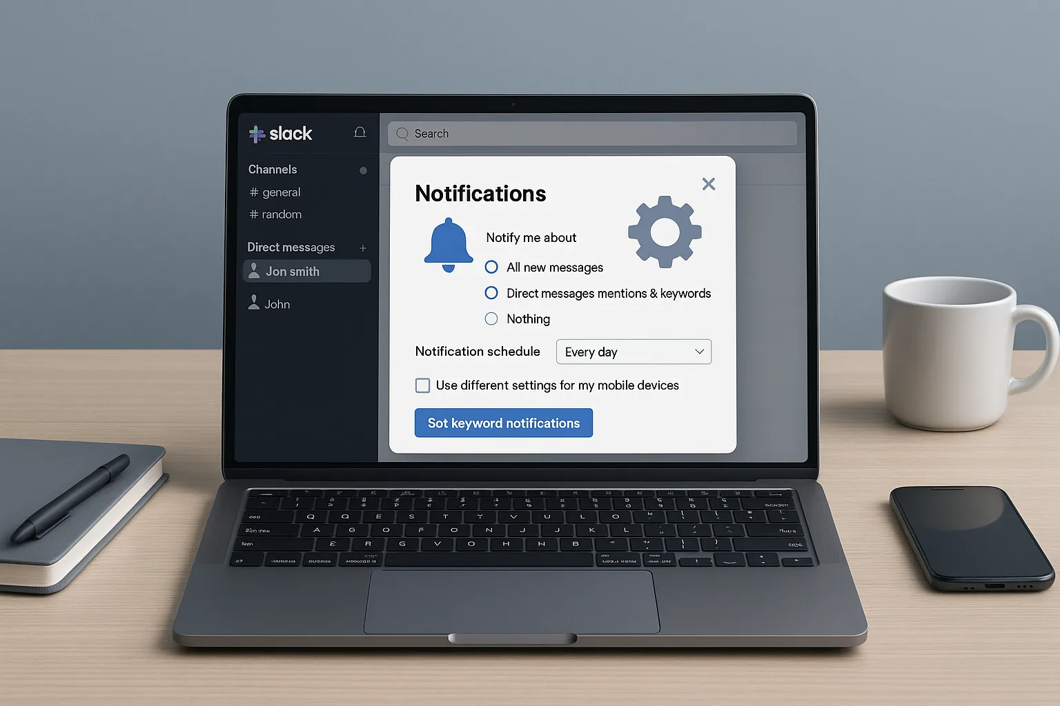 사무실 책상 위의 노트북에 Slack 인터페이스